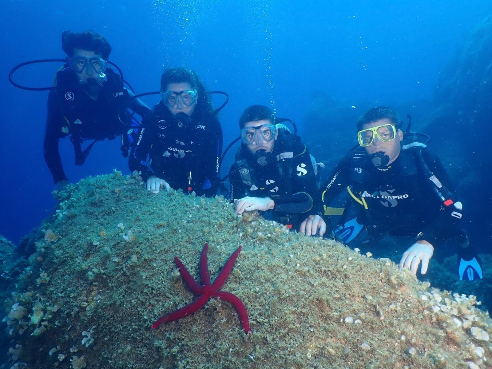 Stijn and his children diving in Sardinia